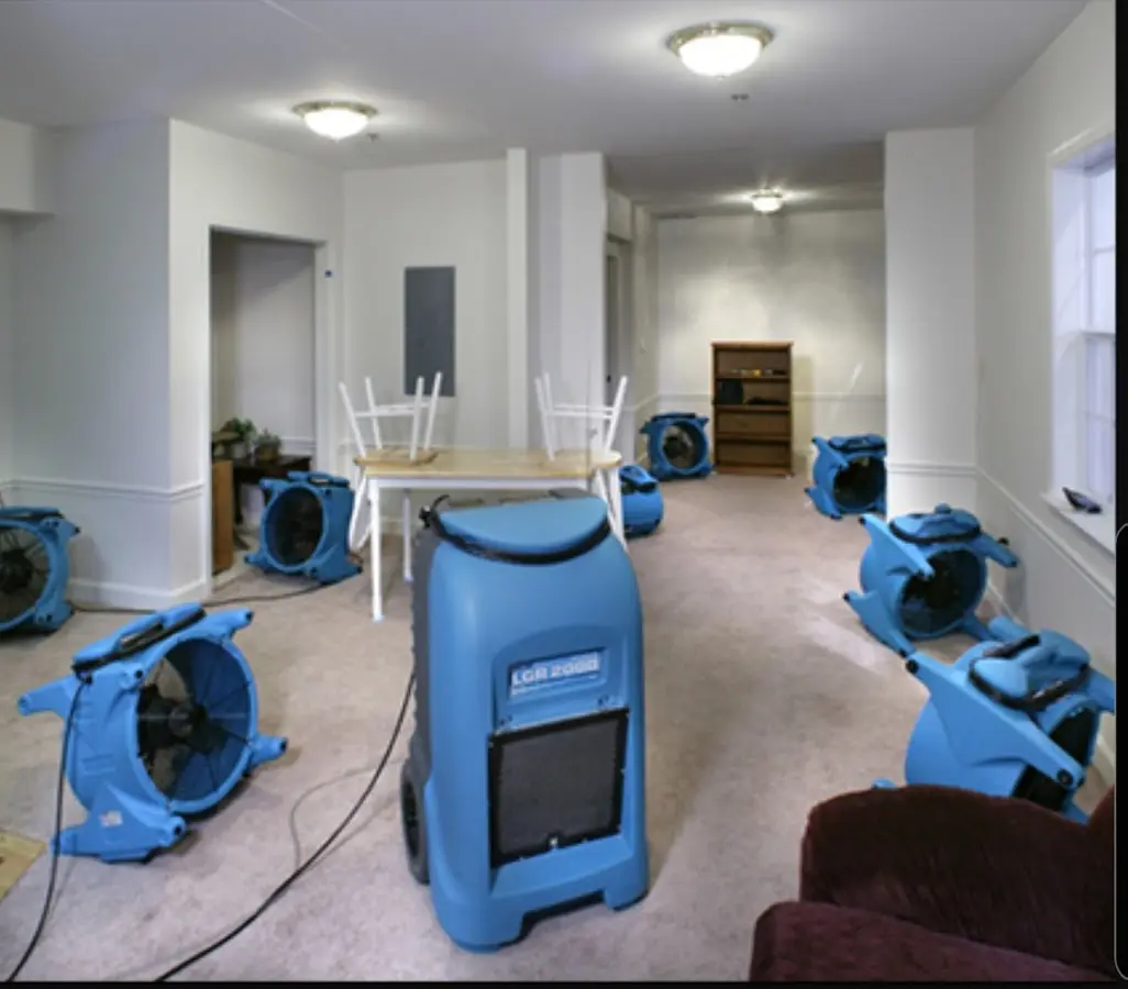 Air movers and dehumidifier setup for Water Damage Restoration in Countryside